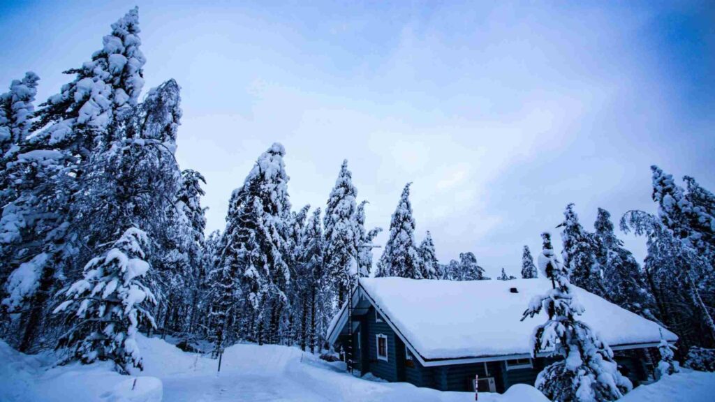 Finland places of interest, winter cabin in snow