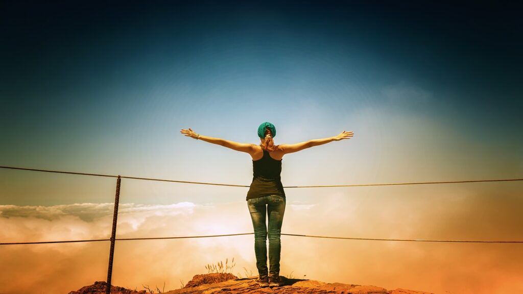 Madeira island attractions, watching sunrise from peak.