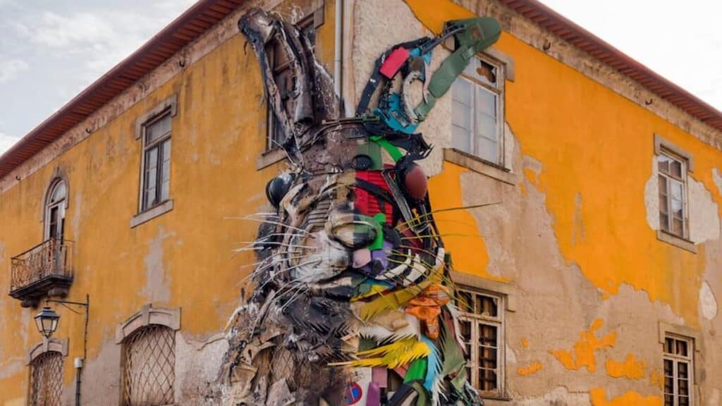 Sightseeing in Porto Portugal, Half Rabbit street art by Bordalo II.