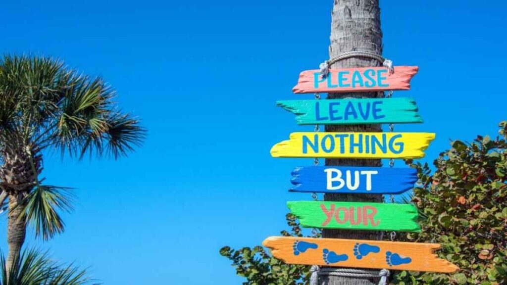 Beach clean ups, leave nothing but your footprints sign.