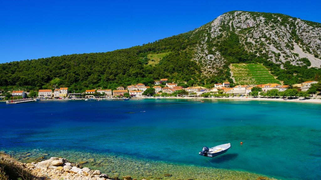 Beaches of Split Croatia, Hills and apartments behind Trstenik Beach
