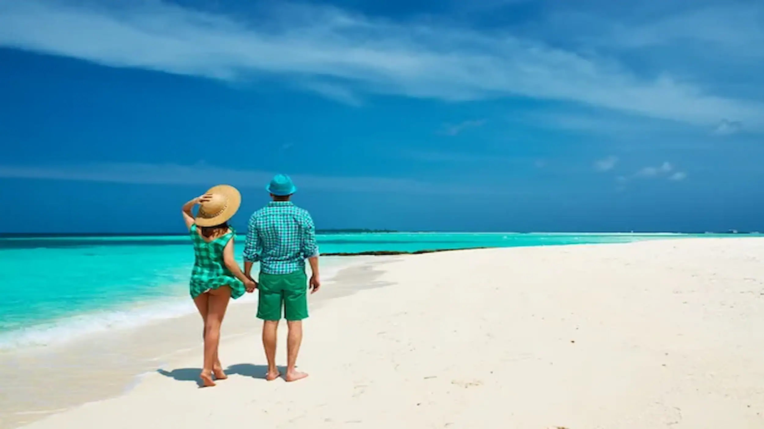Best Maldives Resorts, couple on beach