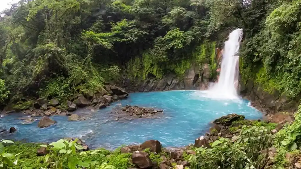 Rio Celeste river, blue waterfall mist