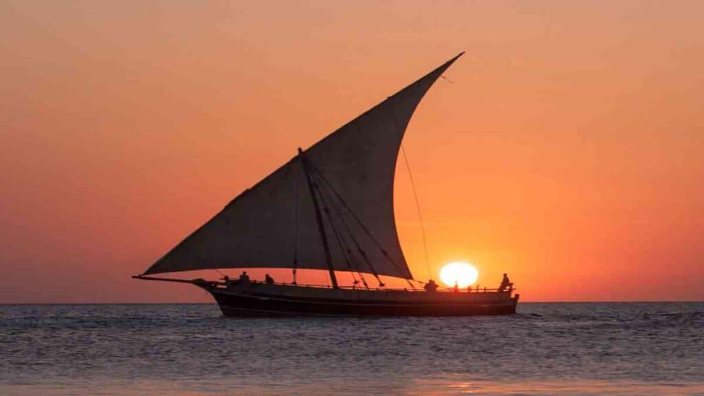 Tofo beach in Mozambique, dhow sailing sunset