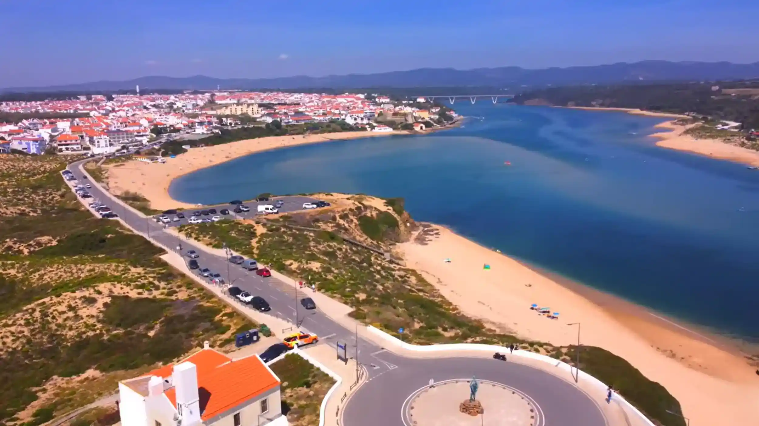 Aerial view using Milfontes as a base showing river estuary beach and village