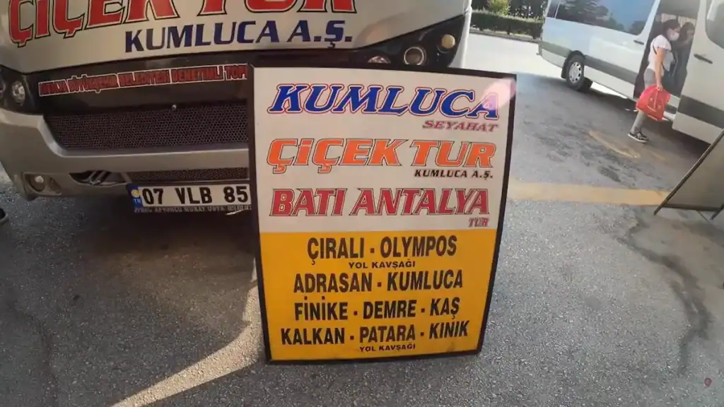 Olympos day trip Antalya dolmus bus sign showing รฤฑralฤฑ and Olympos route