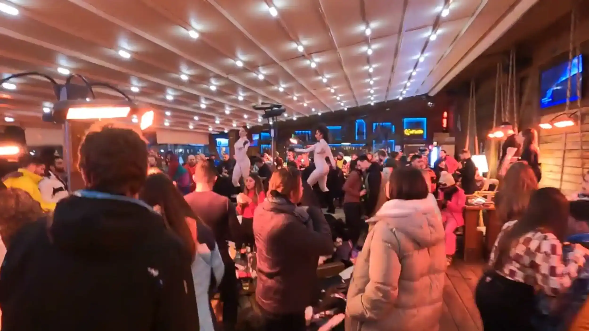 Bansko digital nomad enjoying bar life with live entertainment and social atmosphere indoors