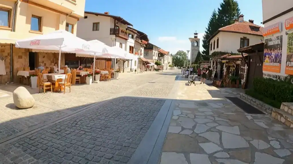Bansko summer vs winter quiet cafe street with outdoor seating areas