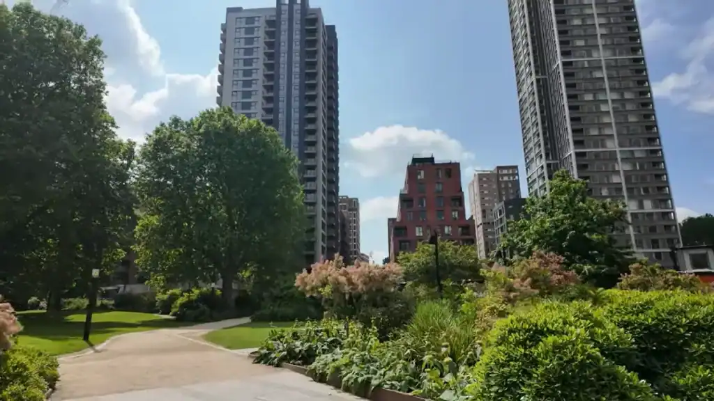 Is Elephant and Castle safe showing peaceful green park space surrounded by residential towers