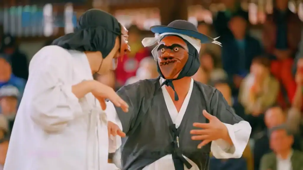 Andong cultural experience traditional mask dance performance at Hahoe Folk Village with colorful wooden masks and traditional Korean costumes