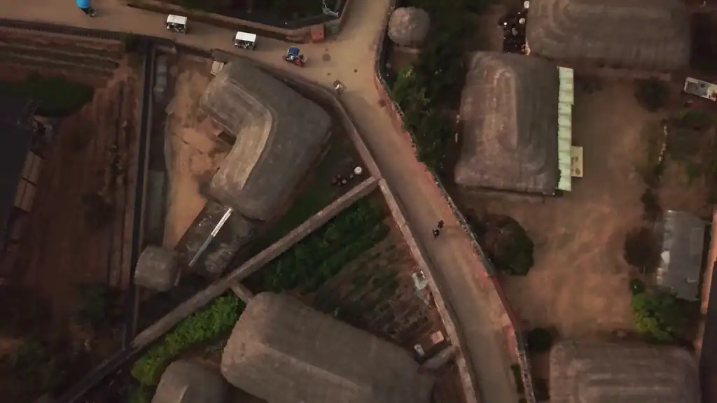 Andong Hahoe Village aerial view of traditional thatched roof houses with straw roofs stone walls courtyards and narrow village pathways