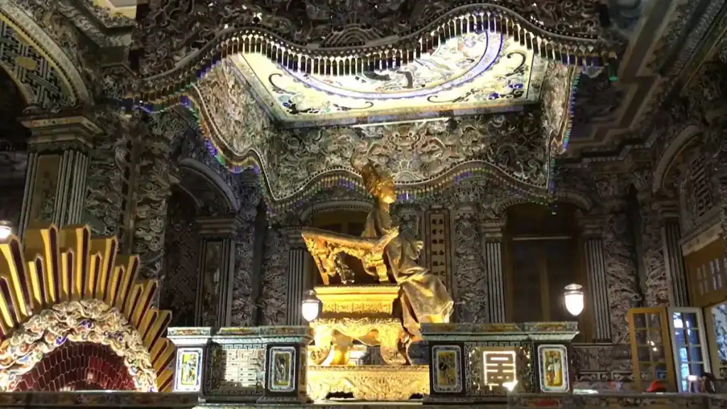 Best Hue Royal Tombs throne room with golden statue and mosaics