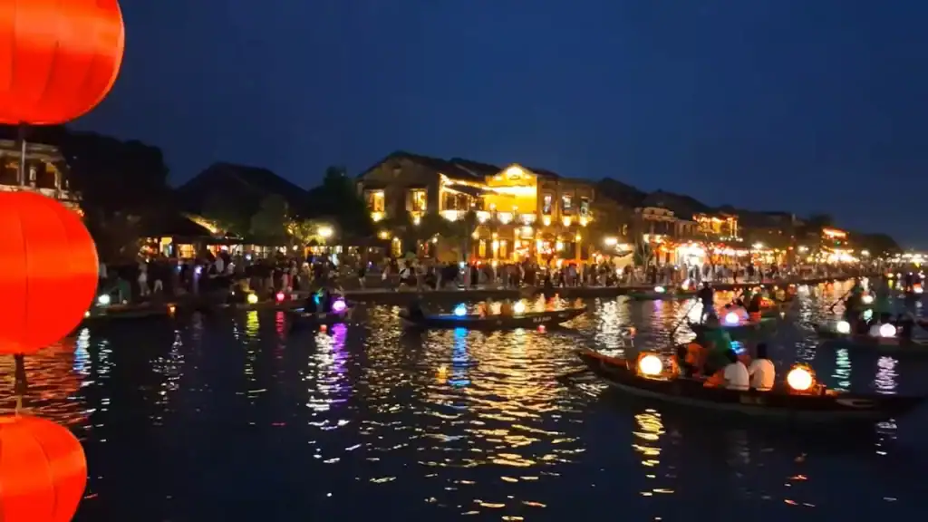 Magical lantern festival along Hoi An riverside at night highlighting Tam Ky vs Hoi An nightlife