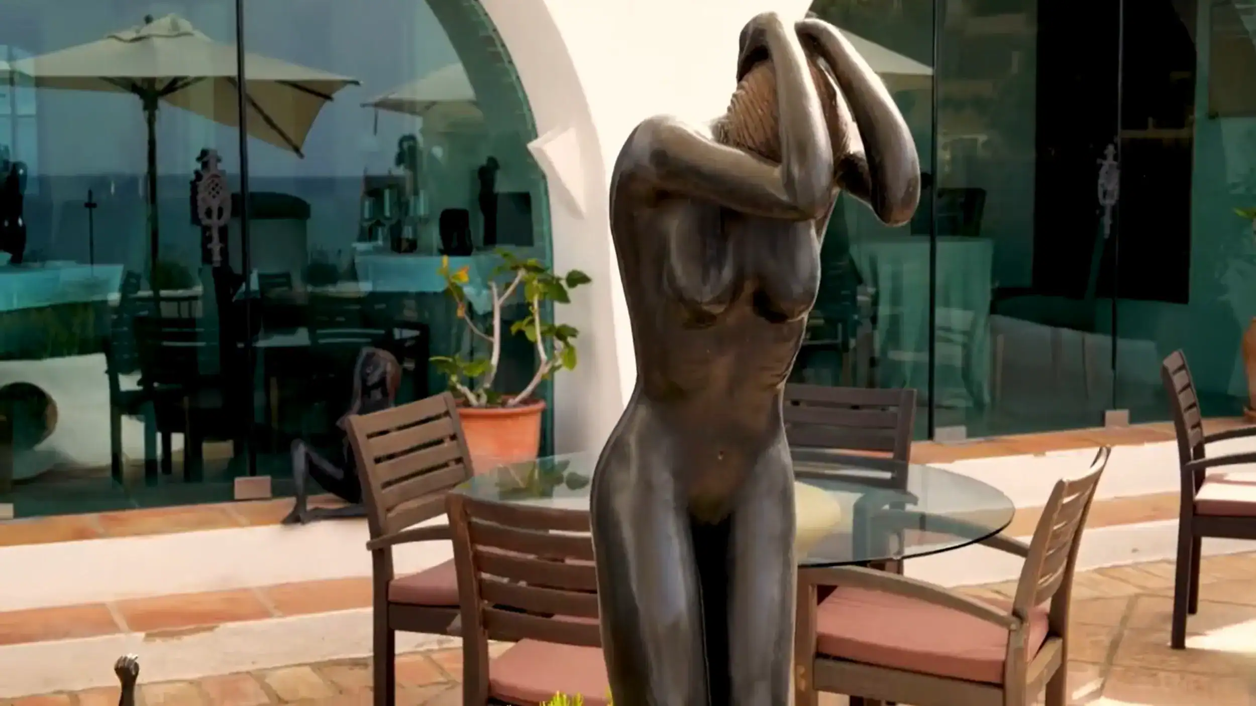 Moraira restaurants worth visiting feature Le Dauphin with distinctive bronze sculpture decor.