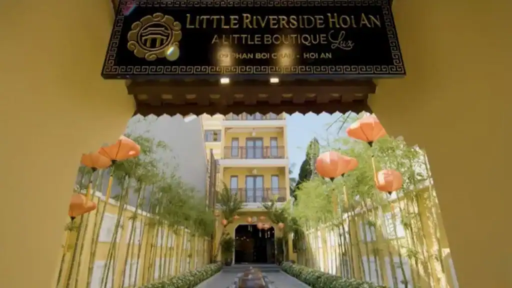 Boutique hotel entrance with lanterns and bamboo in Tam Ky vs Hoi An region