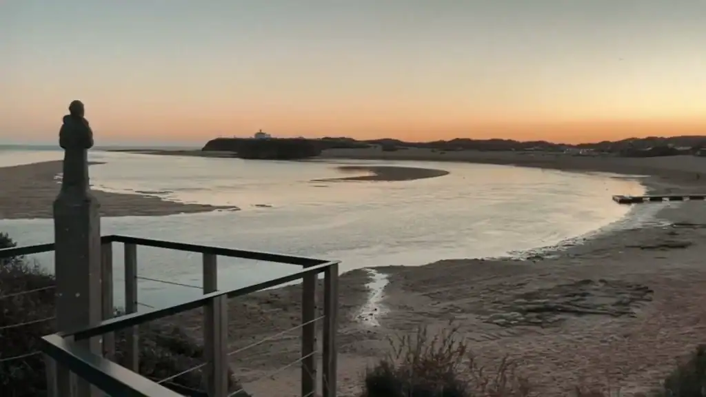 Tranquil estuary sunset view at Milfontes how many days to experience coastal beauty