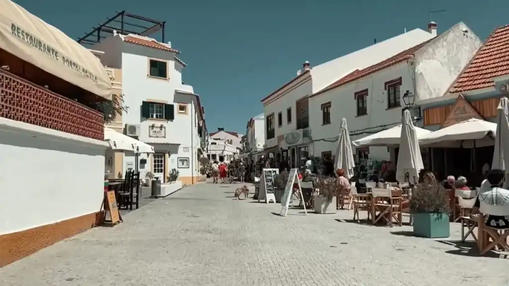 Restaurant lined street in old town Milfontes how many days to enjoy dining