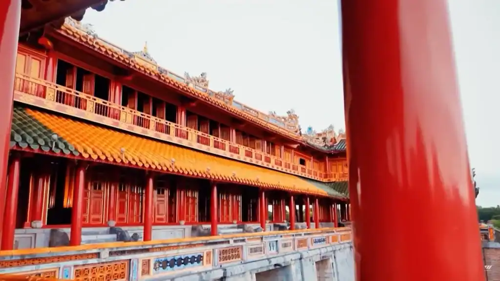 Vibrant red pillars at Hue Imperial City worth it for stunning traditional Vietnamese architecture