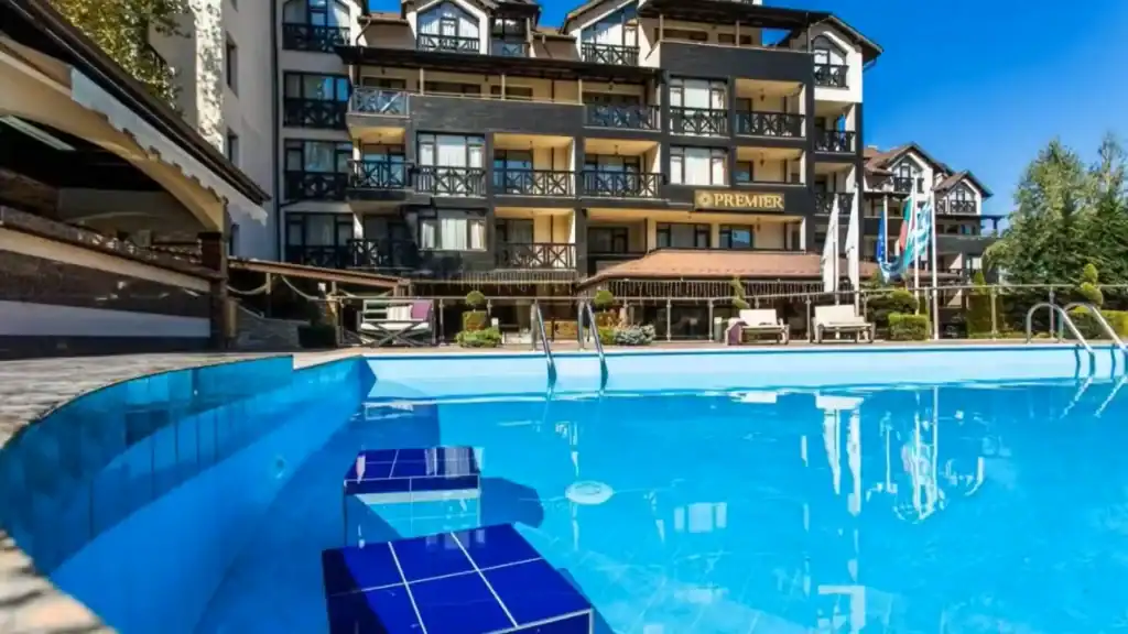 Premier luxury mountain resort with outdoor swimming pool in Bansko in summer