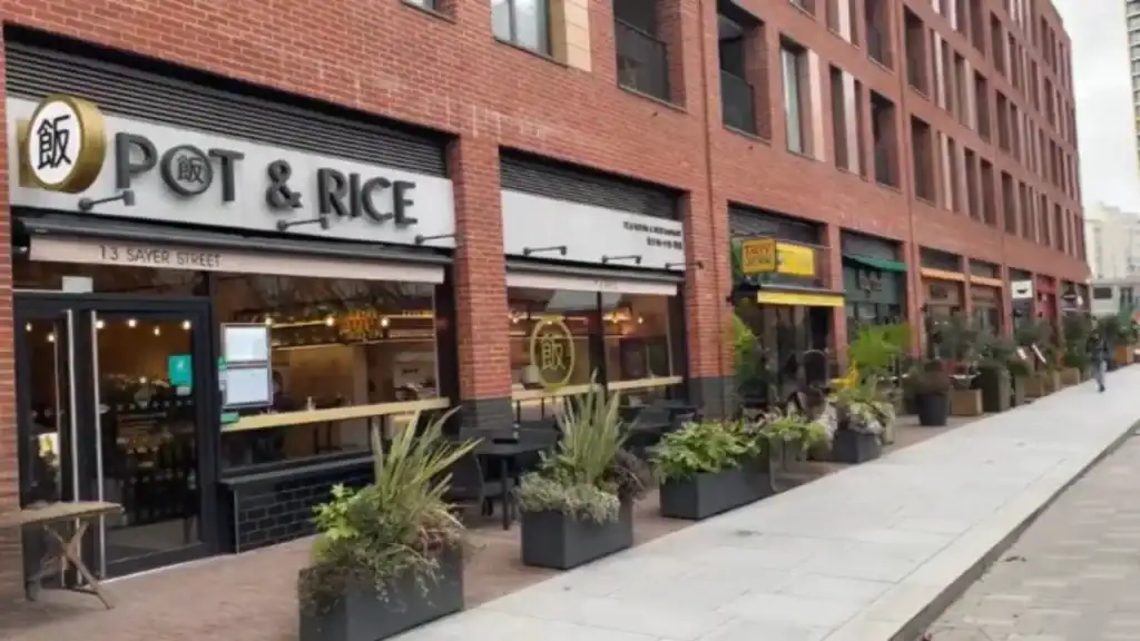 Pot & Rice on Sayer Street with modern storefront and outdoor planters