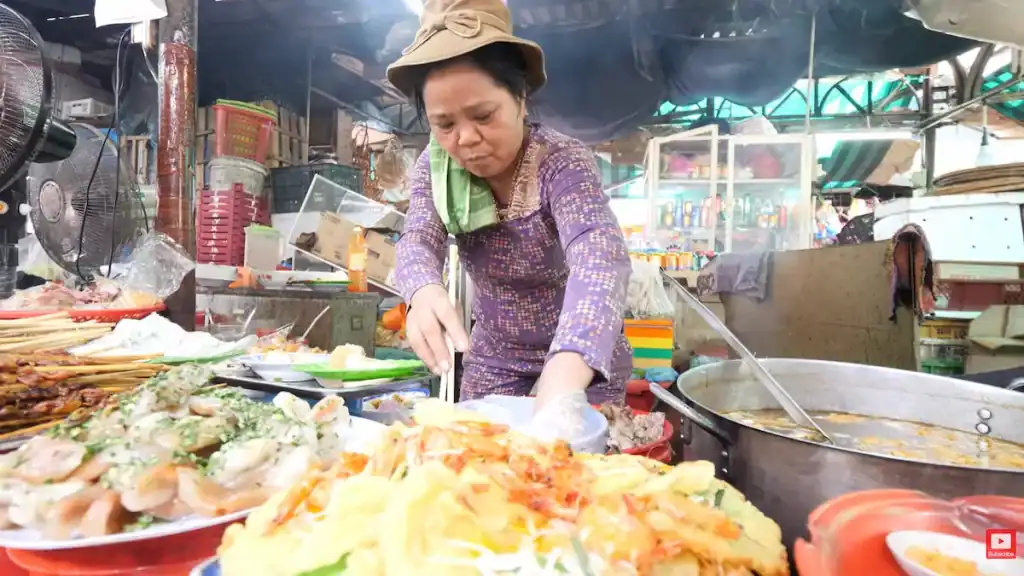 Dong Ba Market street food vendor in Hue shows is Hue worth visiting