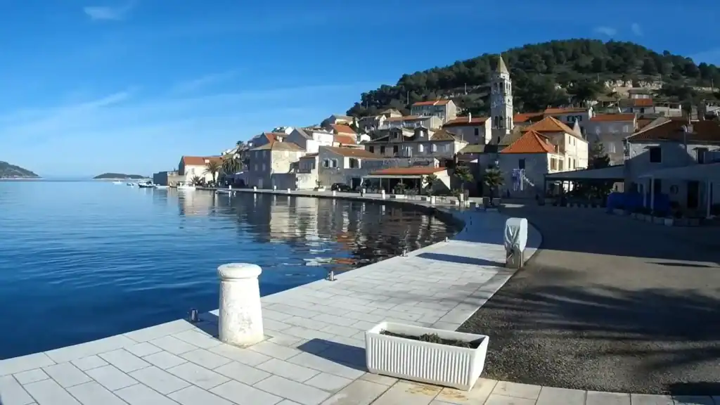 Vis Town waterfront promenade and harbor on Vis island in October