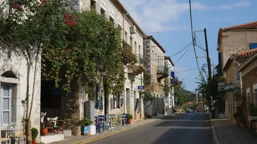 Traditional stone buildings in Kardamyli vs Stoupa showing authentic village architecture and character.
