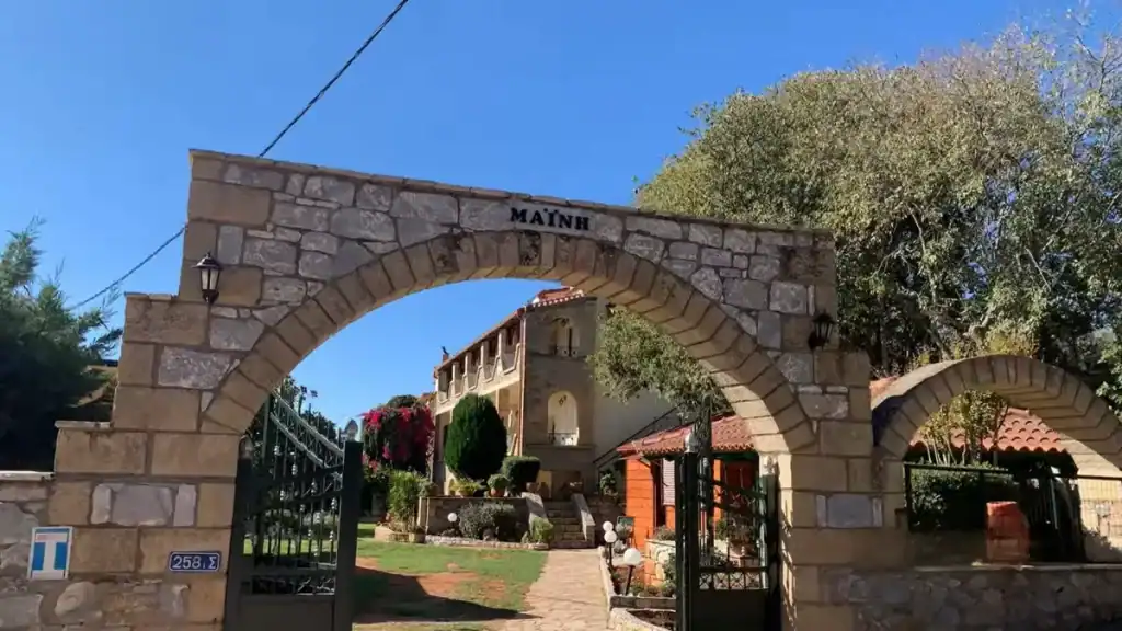 Maini Studios entrance representing Kardamyli vs Stoupa accommodation styles and hospitality options.