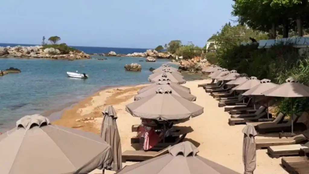Stoupa Beaches offer tranquil coves with sunbeds and rocky coastal scenery.