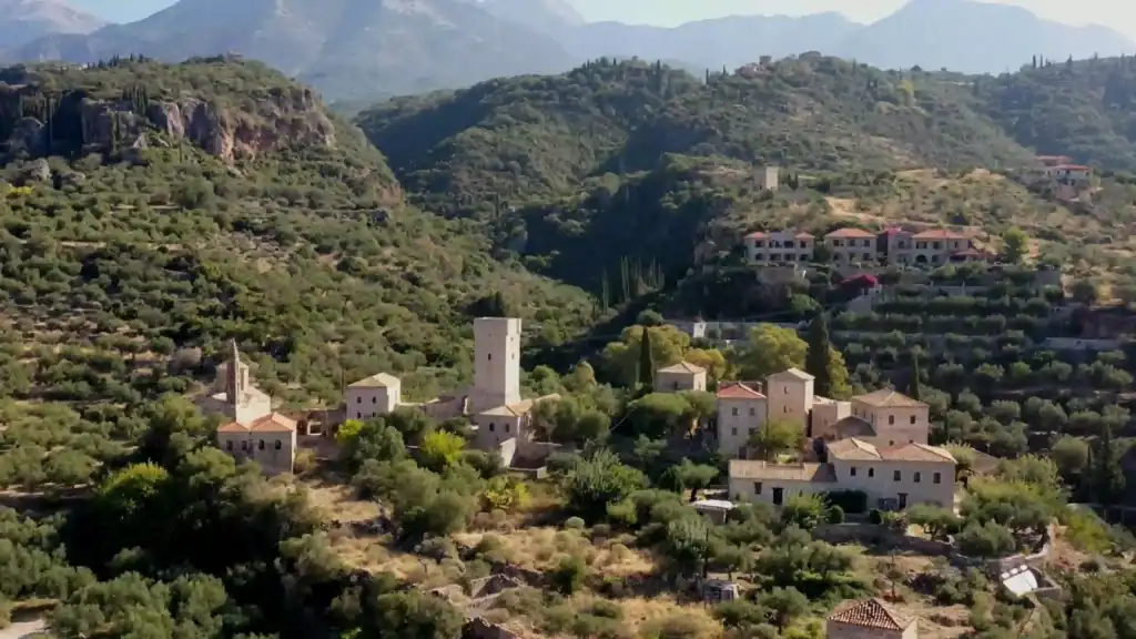 Viros Gorge Kardamyli village with stone tower and traditional buildings.