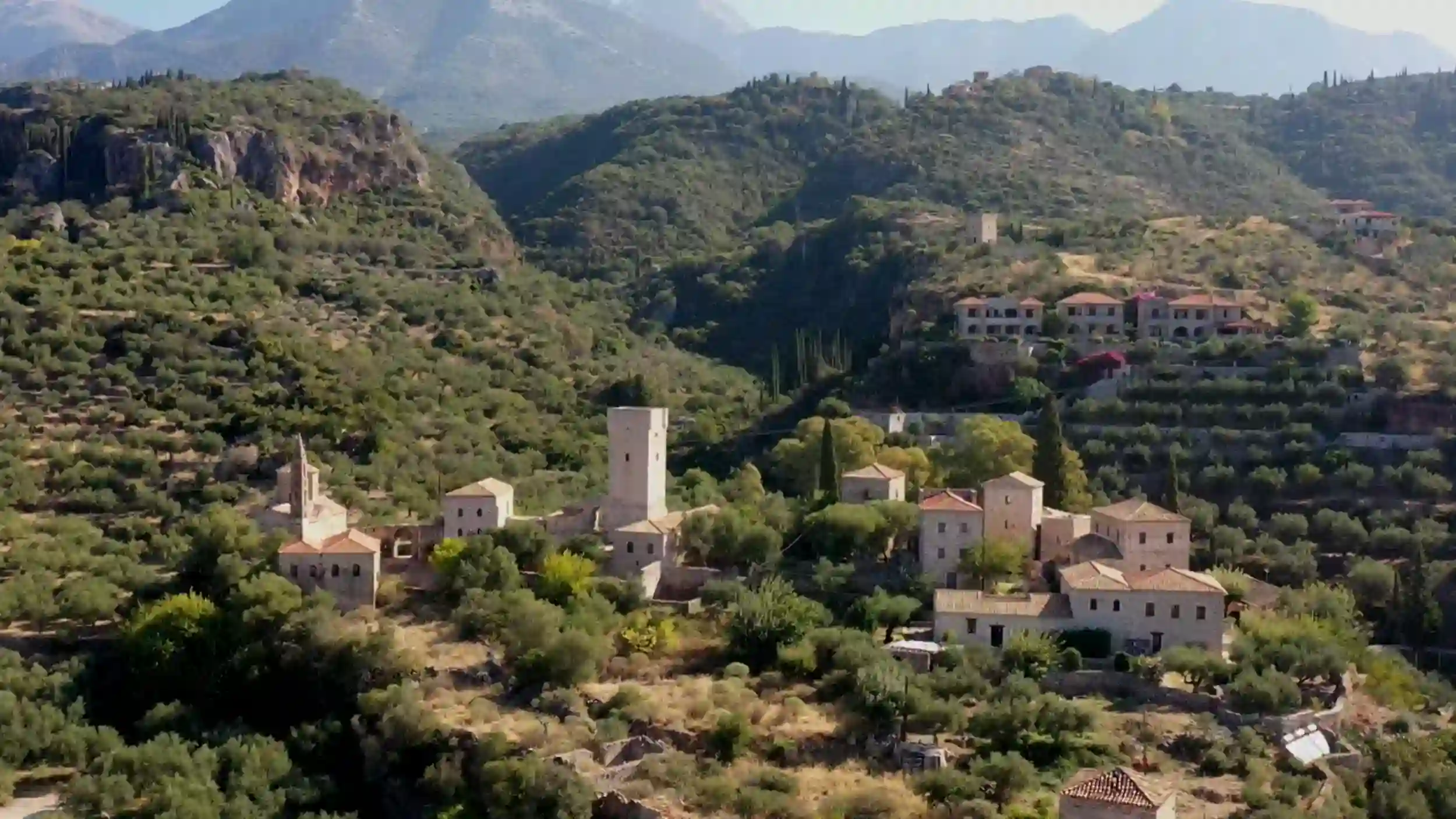 Viros Gorge Kardamyli village with stone tower and traditional buildings.
