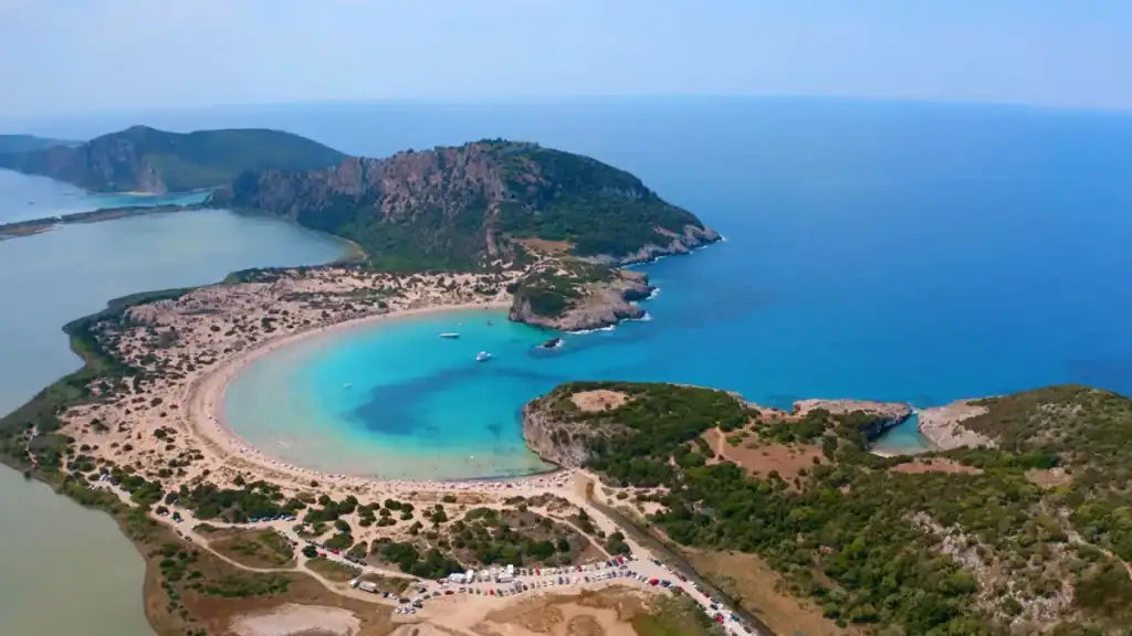 Aerial view of where to stay in Mani with turquoise bay beach.