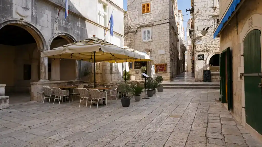 Cafe terrace on Trg Svetog Marka before heading to explore outside Korčula town