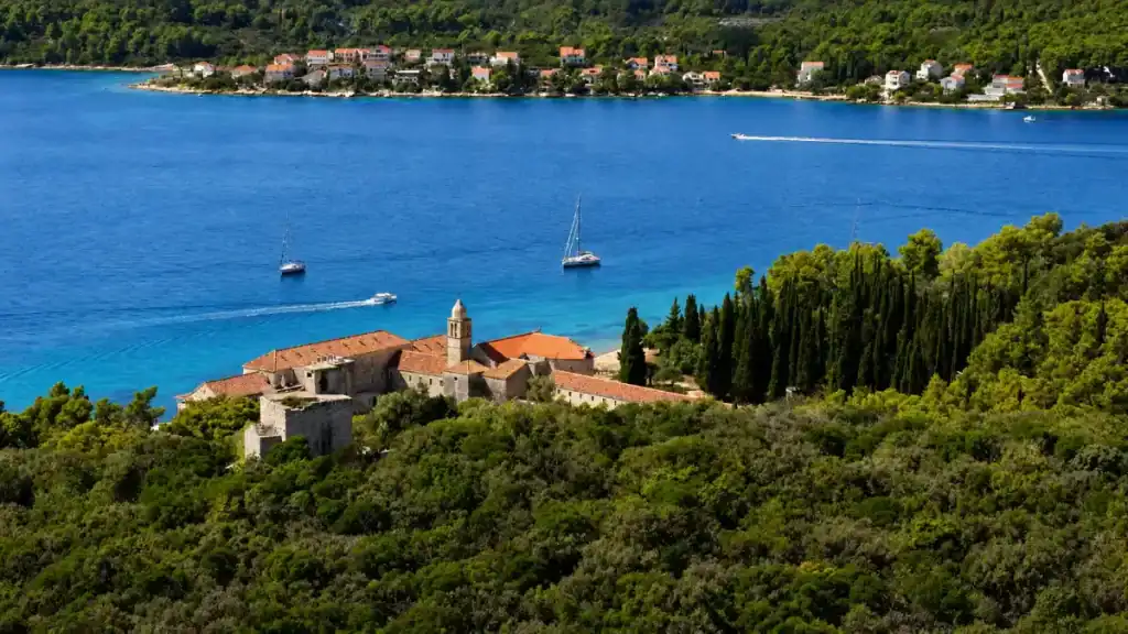 Franciscan monastery surrounded by cypress trees on Badija Island