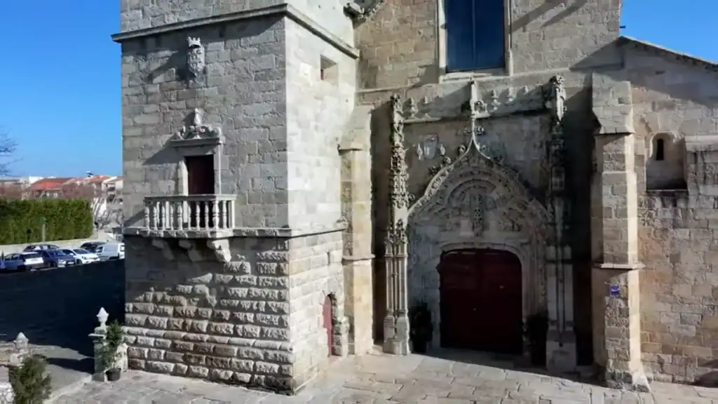 Manueline carved stone doorway on the granite facade of Igreja Matriz