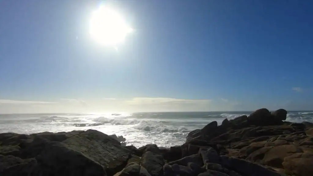 Rocky Atlantic coastline under bright winter sun in Vila do Conde in winter