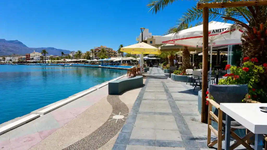 Tiled promenade and harbourfront cafés in Sitia, a quieter East Crete travel guide stop.