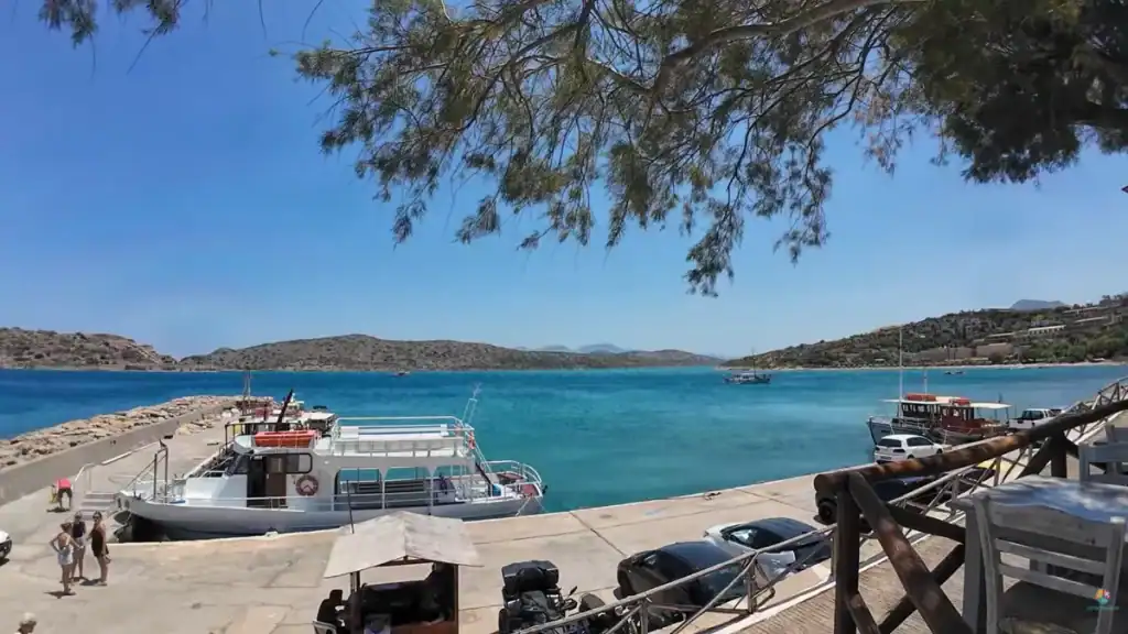 Small ferry boats docked at Plaka harbour, the shortest crossing for visiting Spinalonga from Elounda area