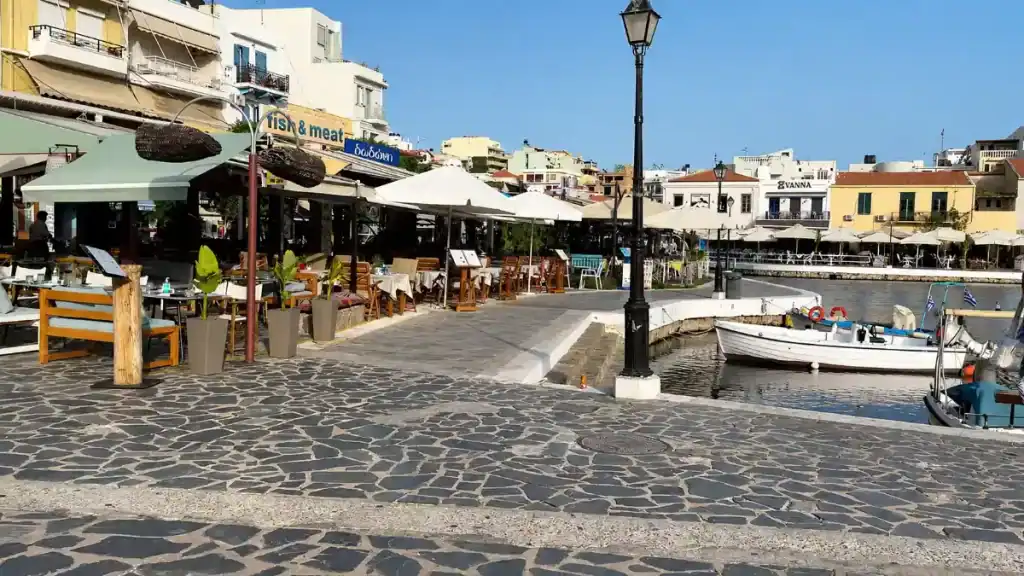 Tavernas and fishing boats lining Lake Voulismeni in Agios Nikolaos, where to stay in East Crete