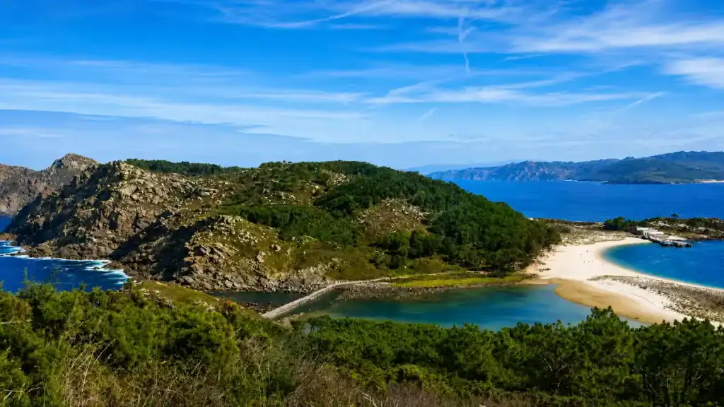 Rugged headland and a thin sandbar linking the islands above the lagoon on the Cíes