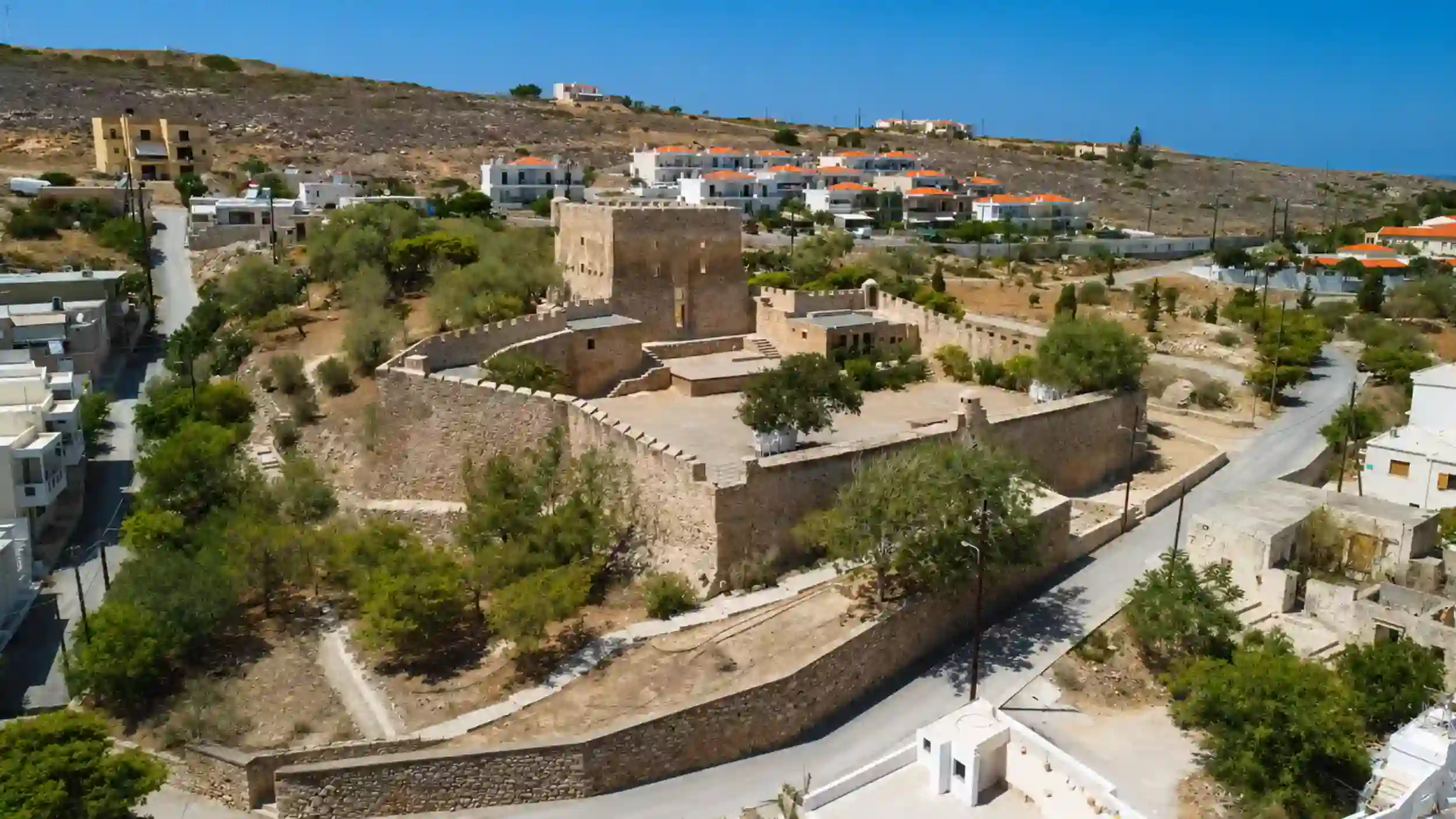 Aerial shot of Kazarma Fortress walls and central tower in Sitia and Palekastro region