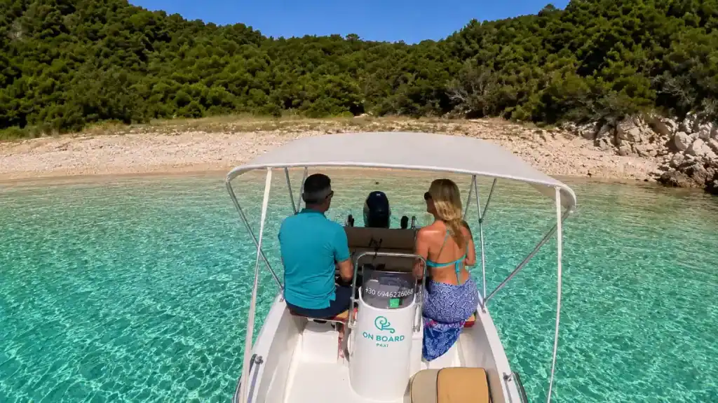 Best things to do in Paxos include hiring a boat near hidden coves.