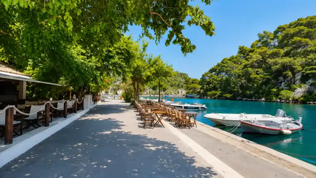 Shaded taverna tables along Gaios waterfront, an easy stroll for anyone wondering if you need a car in Paxos.
