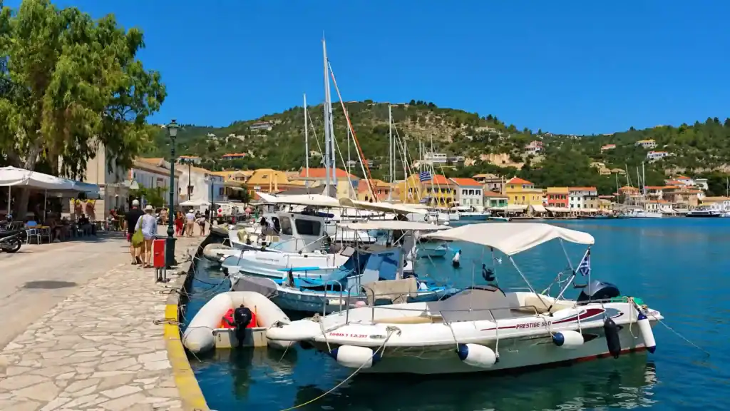 Fishing boats and yachts line the stone quay at Gaios harbour on Paxos.