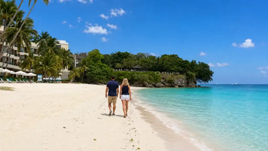 Couple strolling Alona Beach in Panglao, a stop many skip when deciding do you need a car in Bohol
