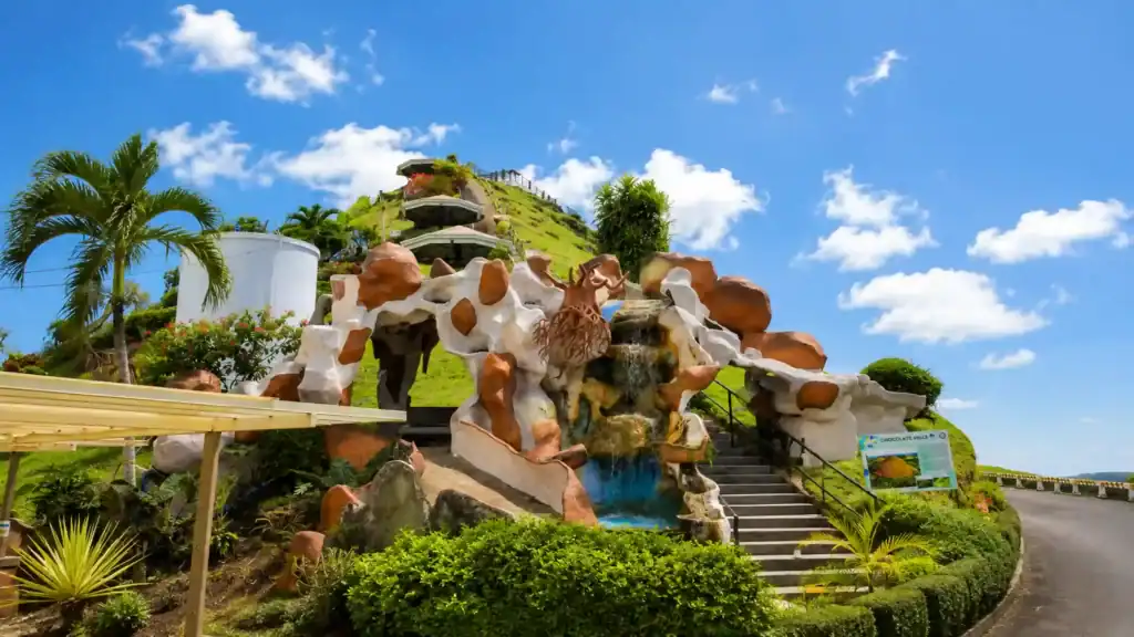 Stone grotto entrance and stairway leading up to Chocolate Hills viewpoint, a top stop for anyone planning to fly or ferry to Bohol