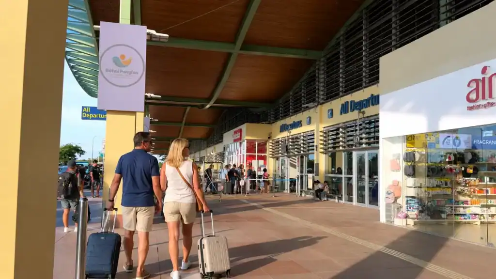 Travellers with rolling suitcases outside Bohol Panglao International Airport, the main option for those choosing to fly or ferry to Bohol