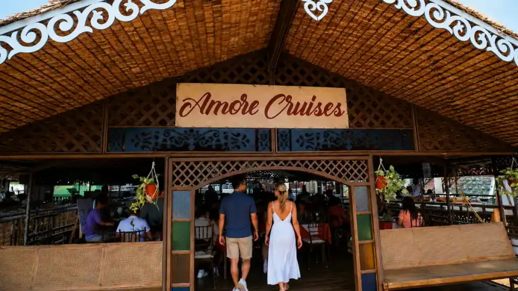 Diners board the Amore Cruises floating restaurant for a Loboc River lunch cruise
