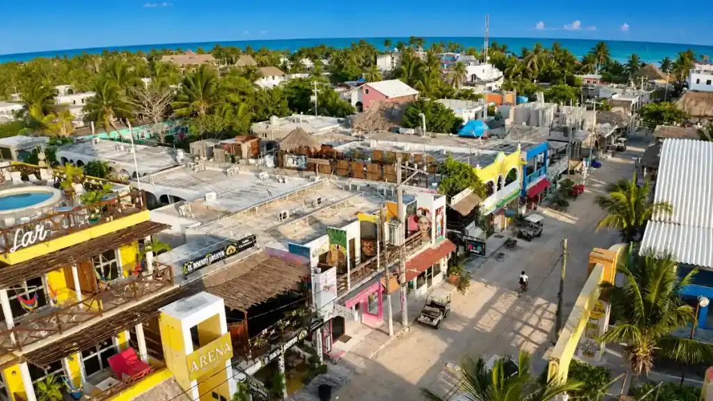 Aerial view of colorful shops and rooftops in Holbox town center