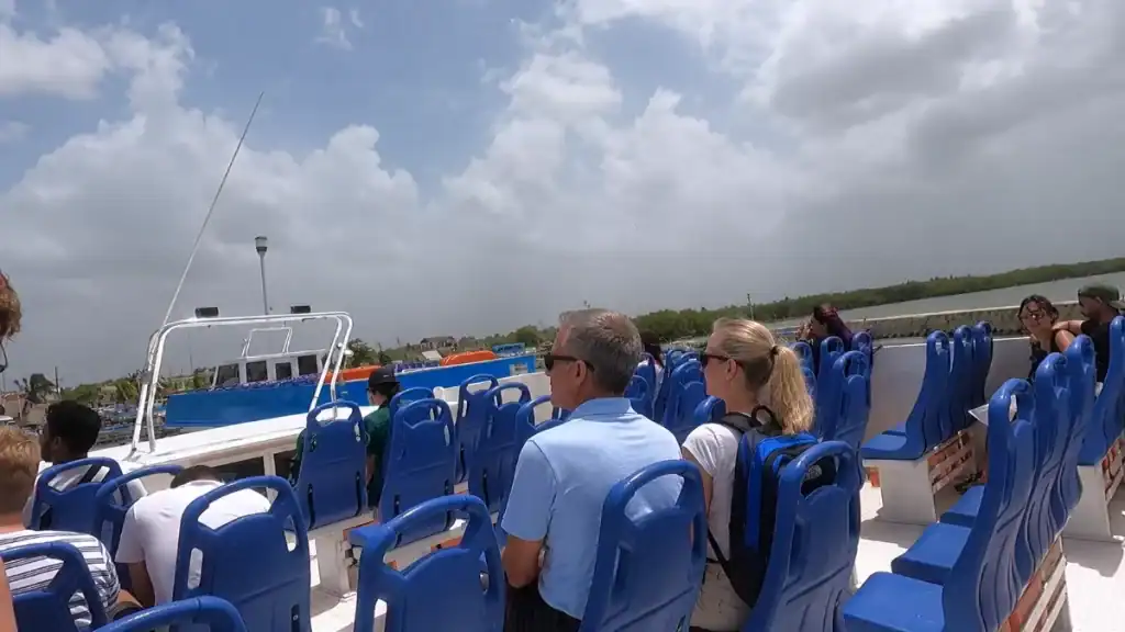 Passengers seated on the ferry crossing the channel to Holbox
